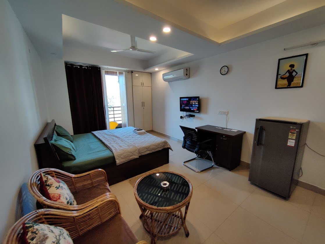 Black Pepper room at Paprika Dehradun — bedroom with Mussoorie view