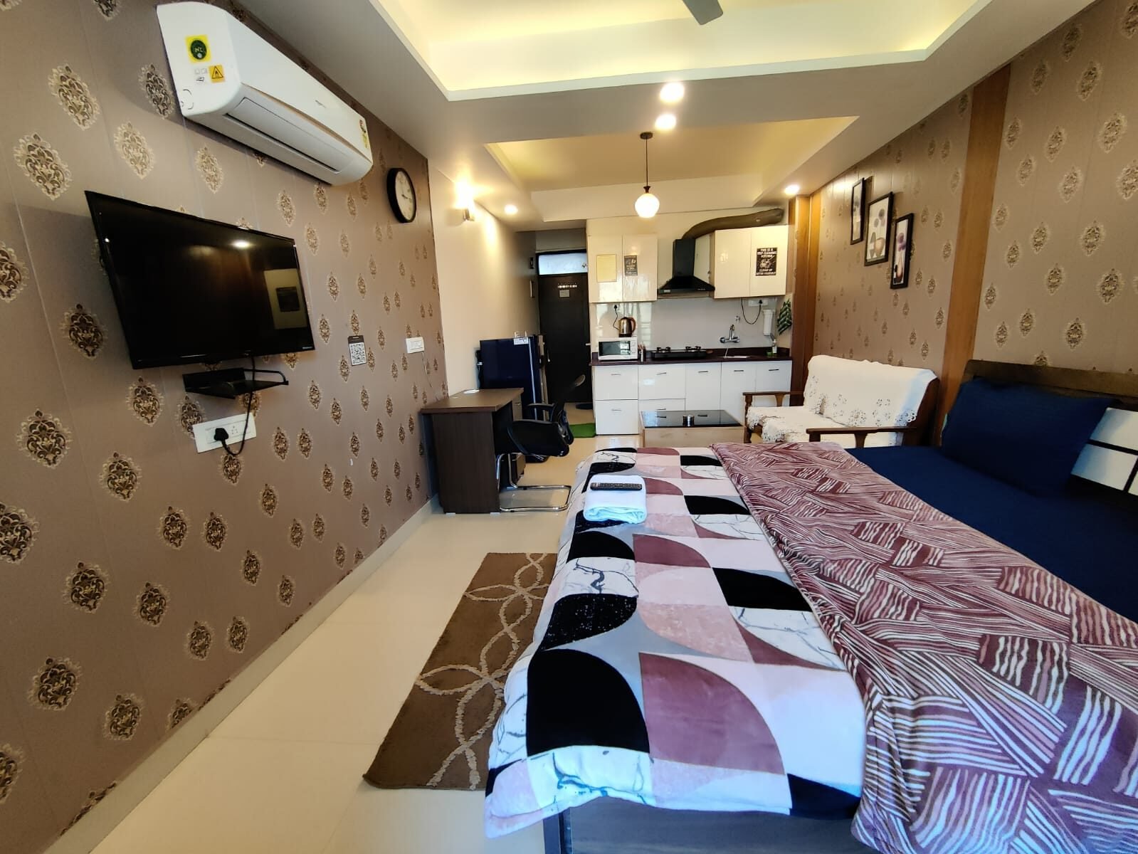 Clove room at Paprika Dehradun — elegant bedroom with Mussoorie view