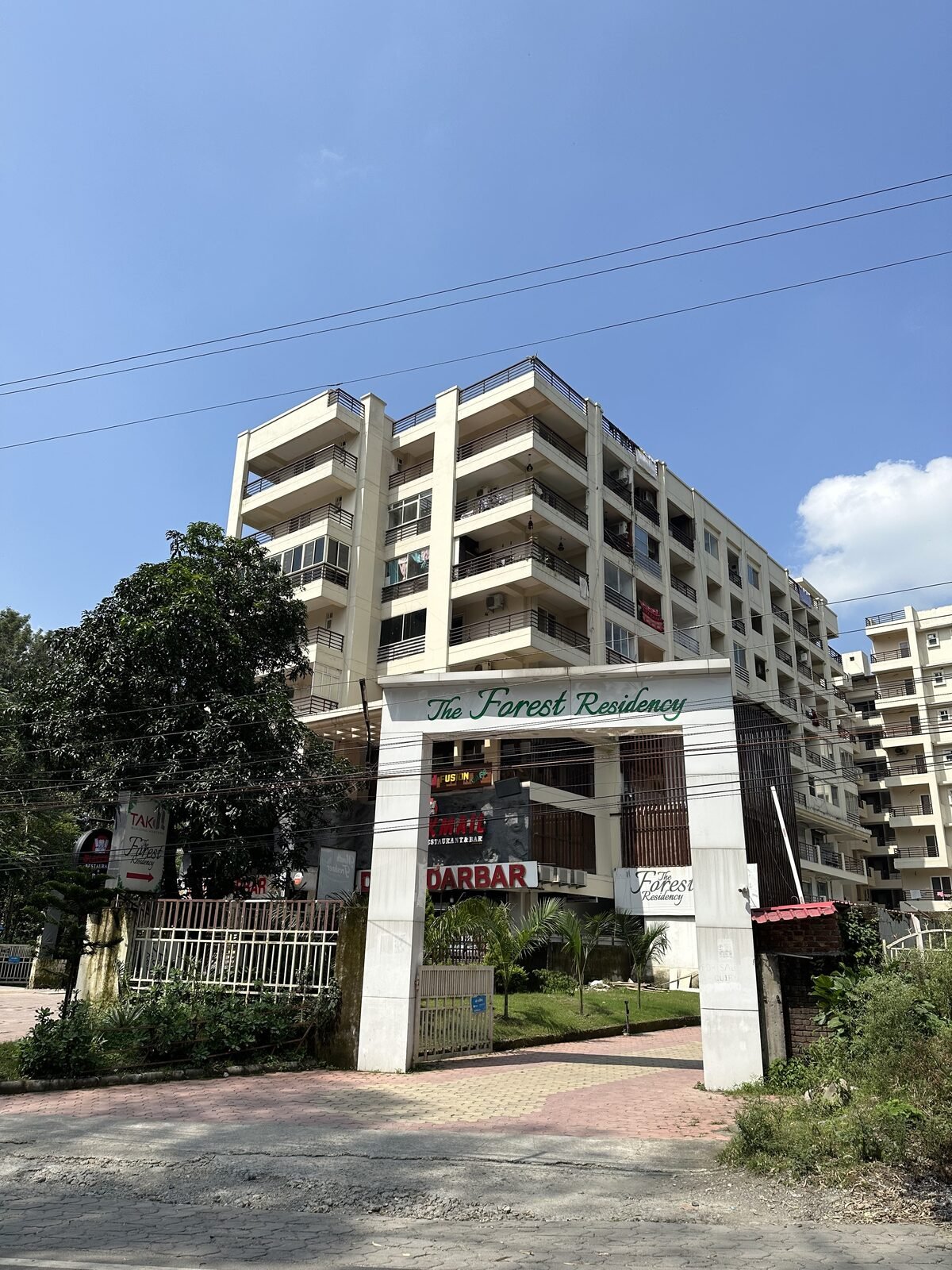 Lime room at Paprika Dehradun — vibrant bedroom with balcony