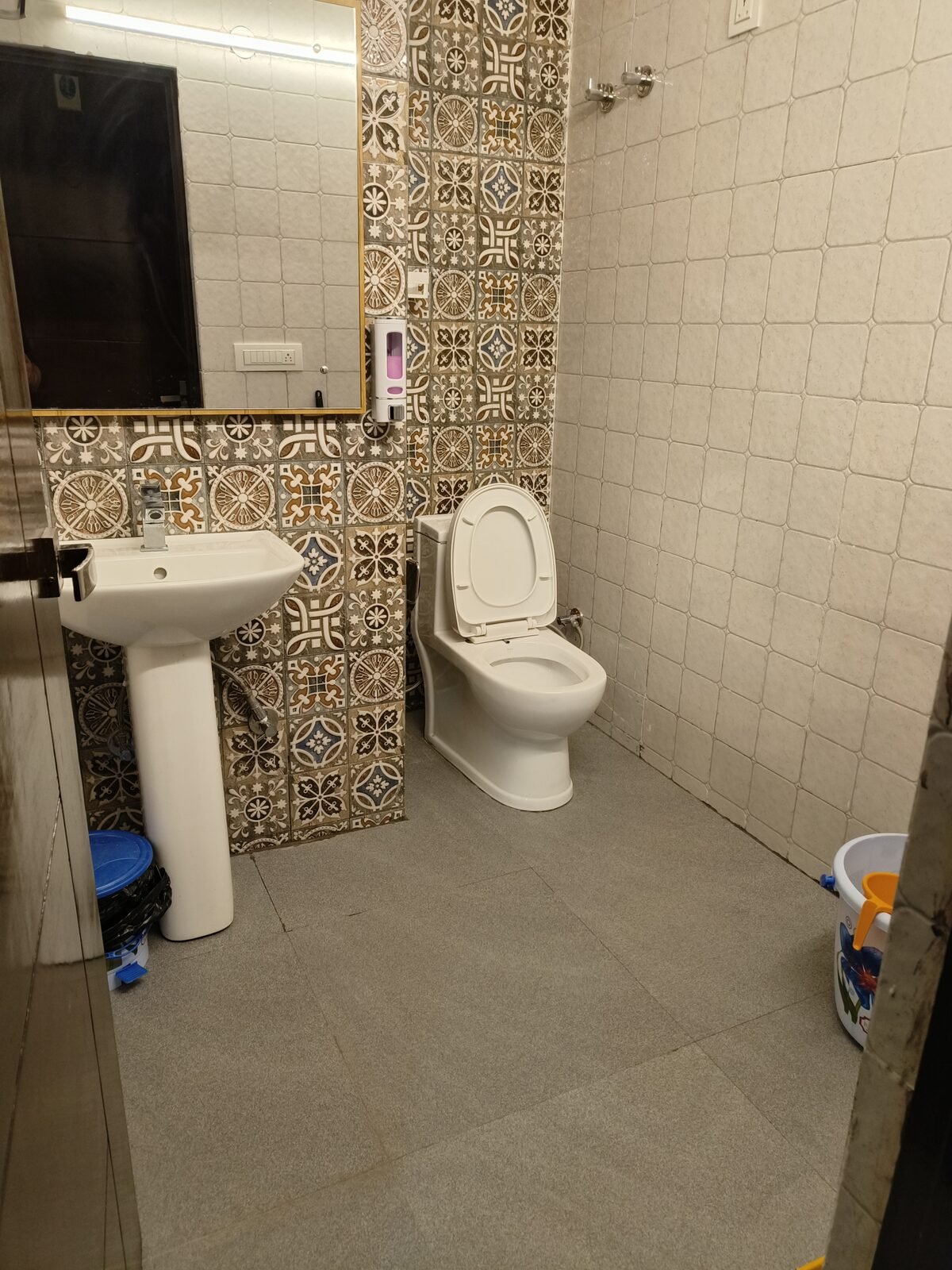 Peach room at Paprika Dehradun — soft bedroom with Mussoorie view